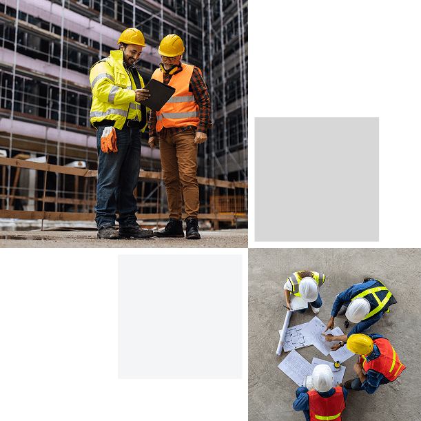 Construction workers reviewing plans on site.
